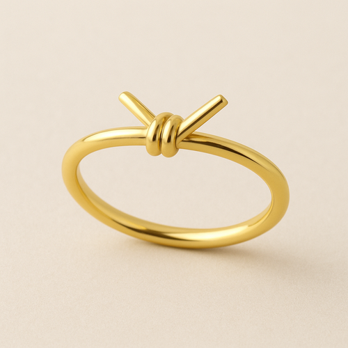 Yellow gold ring made to look like a bread twist tie