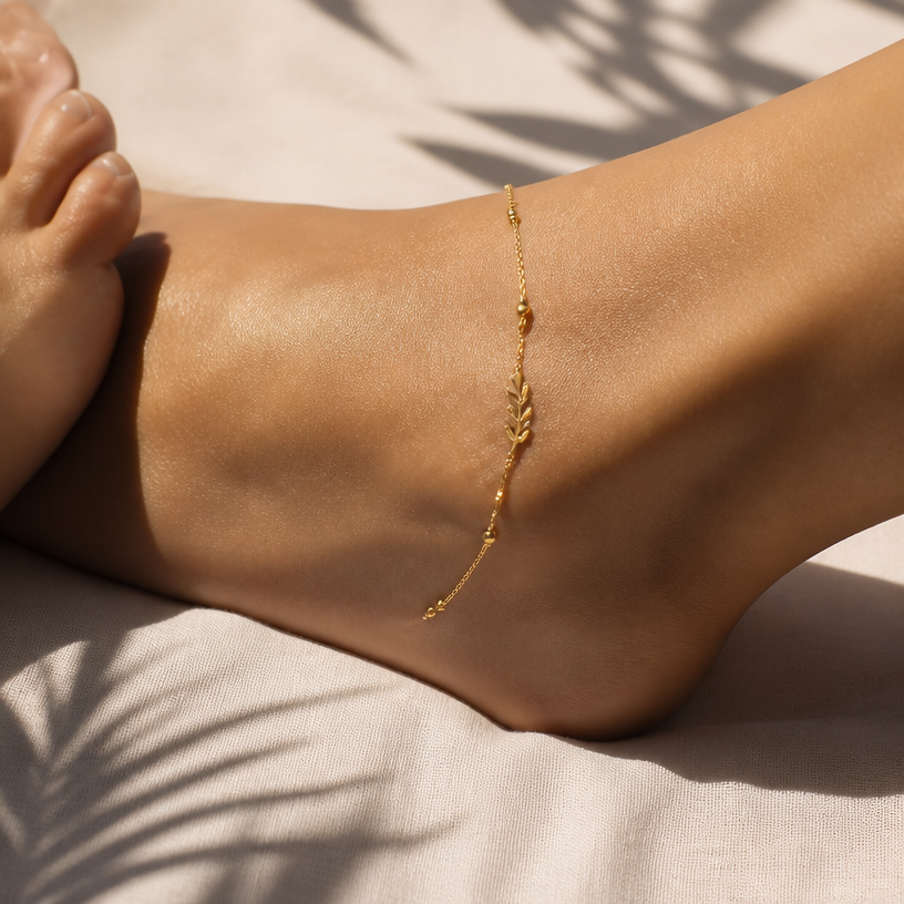 A nature women's anklet made of gold, minimalist, simple and delicate, clean lines
using the attached image as a visual reference, create A nature women's anklet made of gold, minimalist, simple and delicate, clean lines. photorealistic, just the design no text