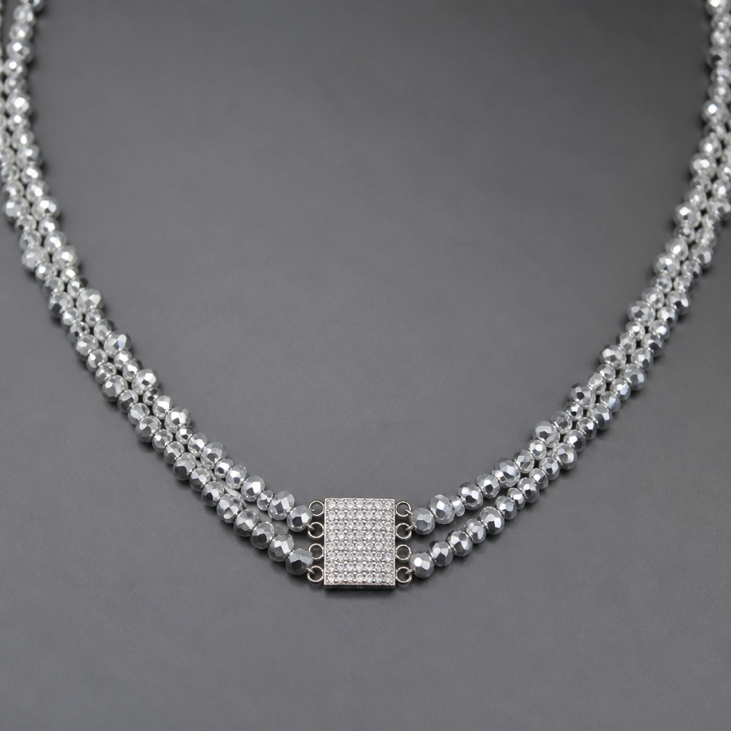A women's necklace. из граненных серебряных бусин, квадратная вставка со стразами, у вставки по пять ушек с двух сторон для крепления, бисер мелкий прозрачный
photorealistic jewelry design, A women's necklace. из граненных серебряных бусин, квадратная вставка со стразами, у вставки по пять ушек с двух сторон для крепления, бисер мелкий прозрачный, modern style, just the design no text