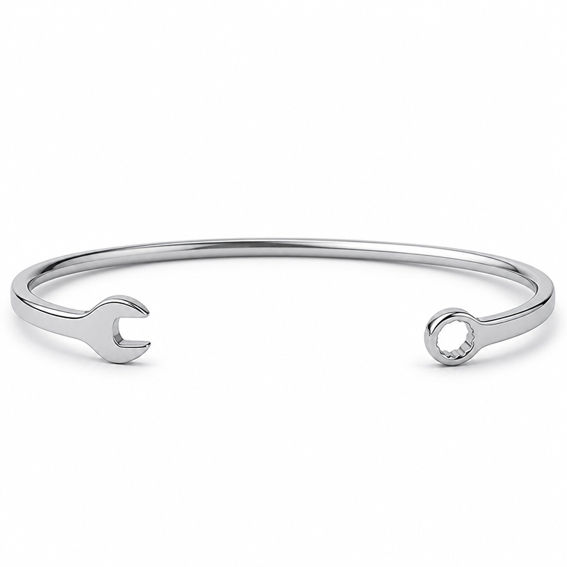 A women's bracelet made of silver, minimalist, simple and delicate, clean lines. a cuff that looks like this wrenche
using the attached image as a visual reference, create A women's bracelet made of silver, minimalist, simple and delicate, clean lines. a cuff that looks like this wrenche. photorealistic, just the design no text