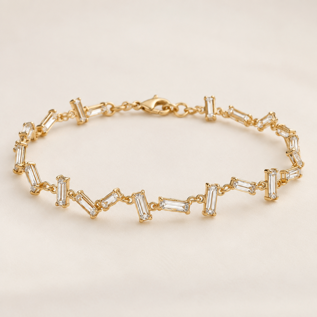 A delicate yellow-gold bracelet featuring clear baguette-cut stones arranged in an irregular, scattered pattern. The baguette stones are set at alternating angles—vertical, diagonal, and slightly horizontal—creating a messy, asymmetrical “floating” effect rather than a perfectly aligned row. Each stone is individually set in a thin gold frame, with small gaps and gold links connecting the pieces. The bracelet should look fine, feminine, and slightly chaotic, like scattered baguette diamonds wrapping around the wrist.
Important details to emphasize: rectangular baguette stones, random orientations, asymmetrical placement, thin yellow-gold settings, and a delicate—not chunky—overall look.
photorealistic jewelry design, A delicate yellow-gold bracelet featuring clear baguette-cut stones arranged in an irregular, scattered pattern. The baguette stones are set at alternating angles—vertical, diagonal, and slightly horizontal—creating a messy, asymmetrical “floating” effect rather than a perfectly aligned row. Each stone is individually set in a thin gold frame, with small gaps and gold links connecting the pieces. The bracelet should look fine, feminine, and slightly chaotic, like scattered baguette diamonds wrapping around the wrist.
Important details to emphasize: rectangular baguette stones, random orientations, asymmetrical placement, thin yellow-gold settings, and a delicate—not chunky—overall look., modern style, just the design no text
