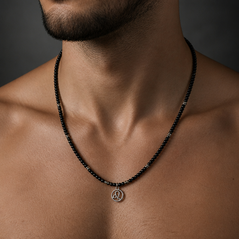 he needs to wear a white T-shirt or be topless so the necklace is more visible. also make it a Little bit longer
edit the attached jewelry design with these instructions: he needs to wear a white T-shirt or be topless so the necklace is more visible. also make it a Little bit longer. keep it photorealistic, just the design no text