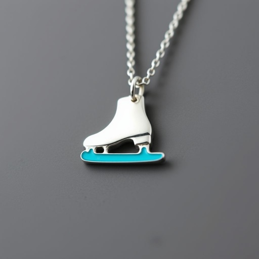 Silver Pendant shape one ice skate with turquoise stripe inside the low thin part blade
