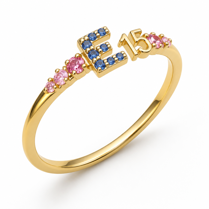 A minimalist women's ring. um anel de 15 anos na cor dourada com inicial E com pedrinhas azul e pedrinhas rosa em volta
using the attached image as a visual reference, create A minimalist women's ring. um anel de 15 anos na cor dourada com inicial E com pedrinhas azul e pedrinhas rosa em volta. photorealistic, just the design no text