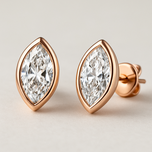A marquis stude earrings with rose gold bazl