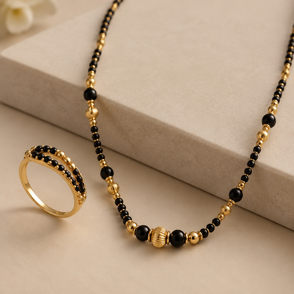 A women's ring. a mangalsutra with black beads small and big and a gold beads along with them
photorealistic jewelry design, A women's ring. a mangalsutra with black beads small and big and a gold beads along with them, modern style, just the design no text