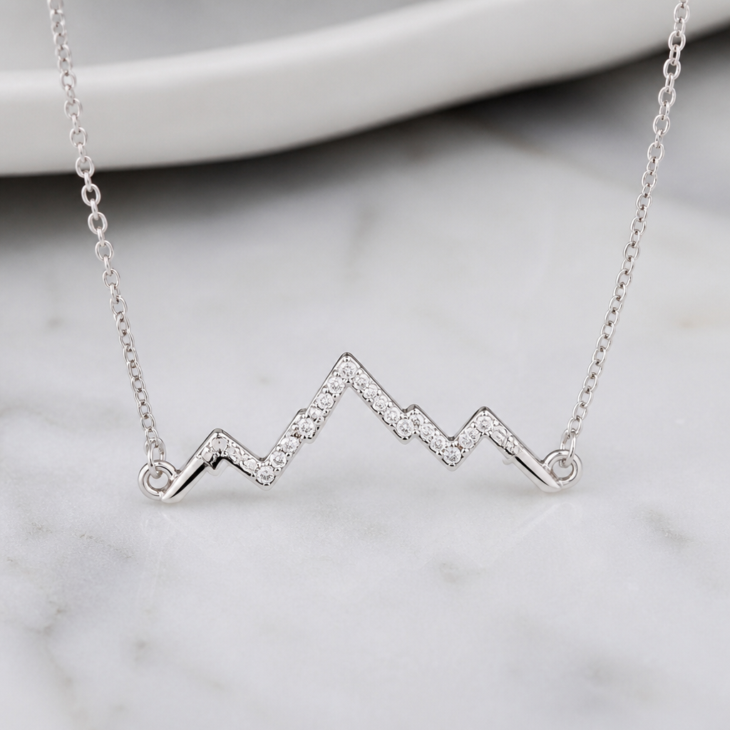 A women's necklace made of silver with diamond stones. S'inspirer de montagne, minimaliste et metaux fins
photorealistic jewelry design, A women's necklace made of silver with diamond stones. S'inspirer de montagne, minimaliste et metaux fins, modern style, just the design no text