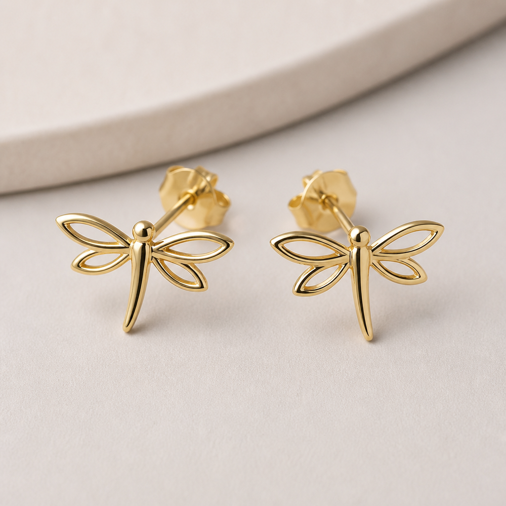A modern women's earrings made of gold. zart fein klein libelle
photorealistic jewelry design, A modern women's earrings made of gold. zart fein klein libelle, modern style, just the design no text