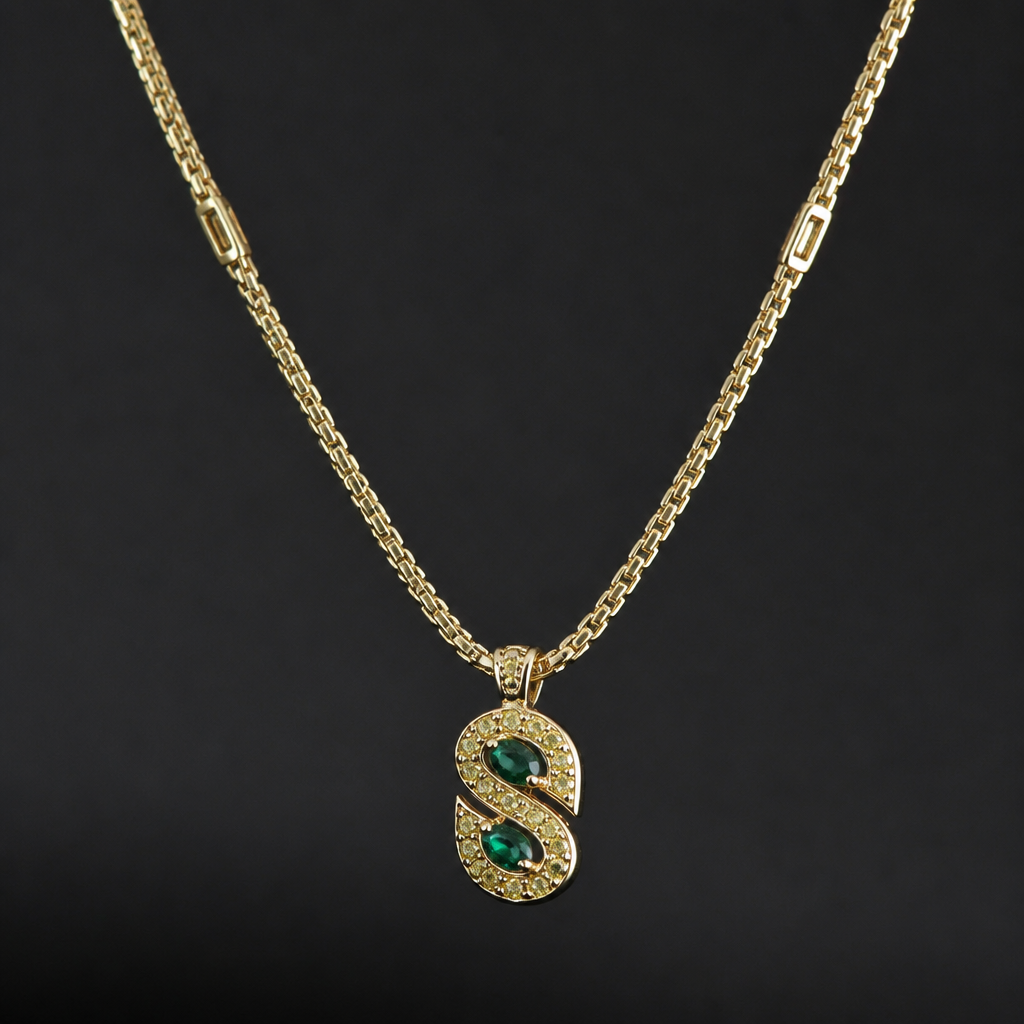 A men's necklace made of gold with diamond and emerald stones. delicada cadena con letras s con diamantes amarillos y la cadena sea con tejido especial
photorealistic jewelry design, A men's necklace made of gold with diamond and emerald stones. delicada cadena con letras s con diamantes amarillos y la cadena sea con tejido especial, modern style, just the design no text