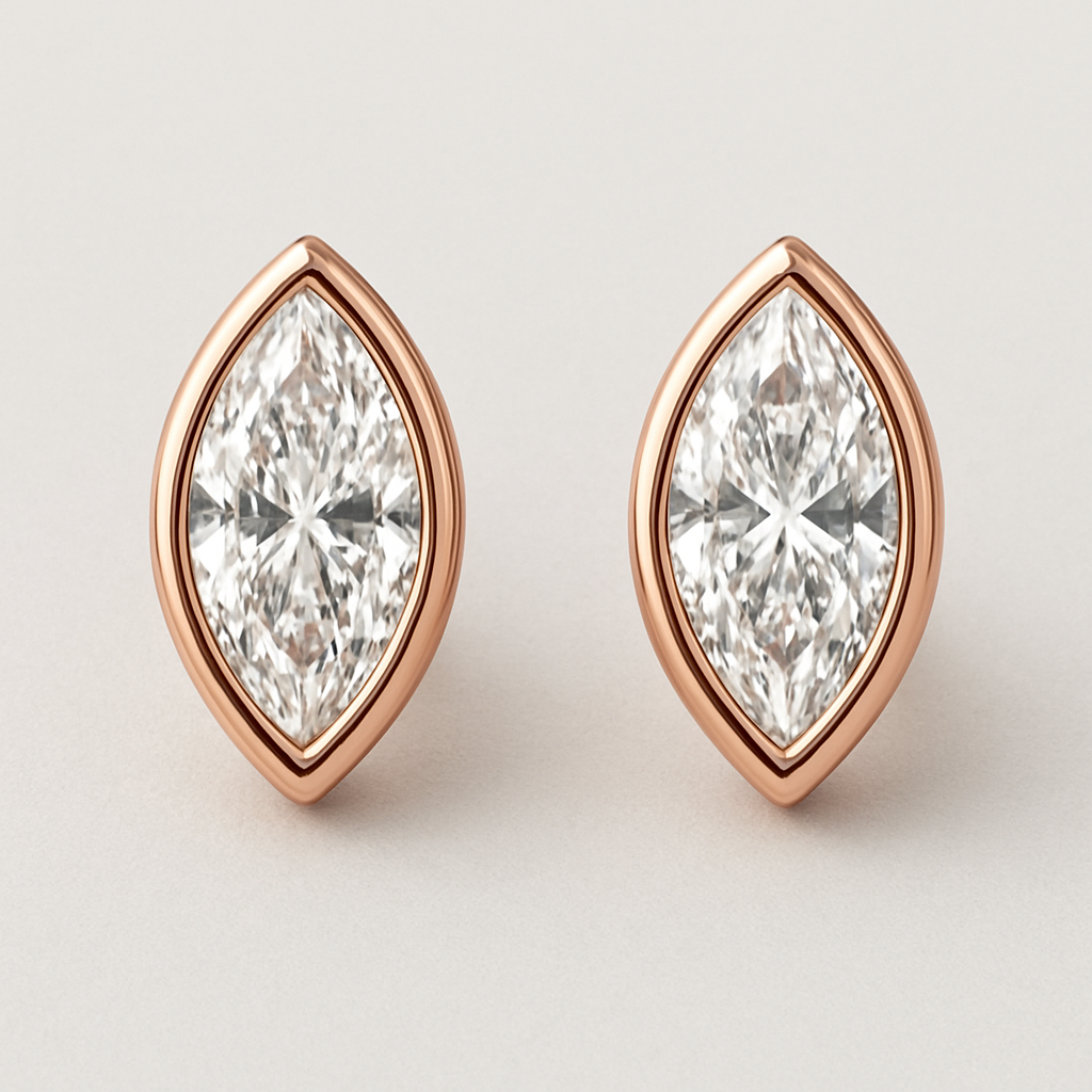 A marquis stude earrings with rose gold bazl