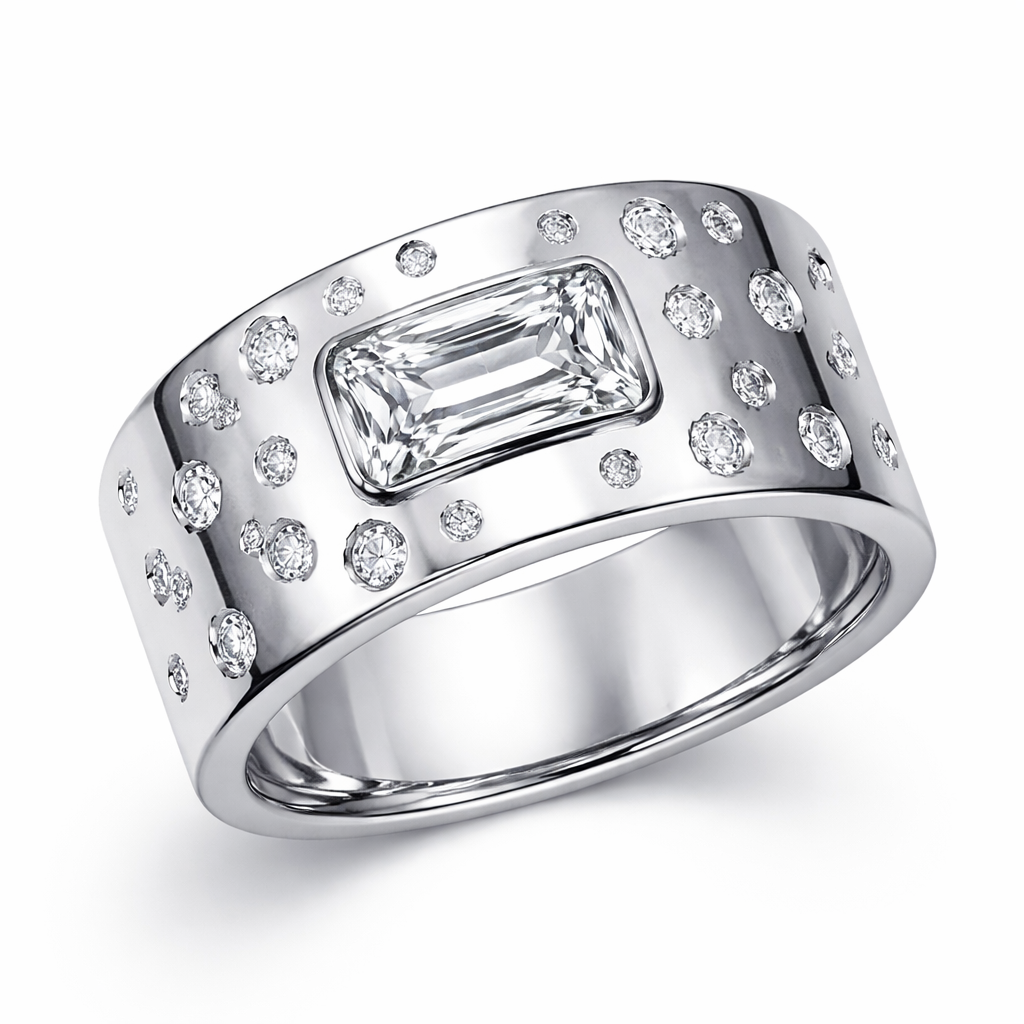 Extra wide curved white gold band with horizontal emerald cut diamond with 20 scattered small round diamonds