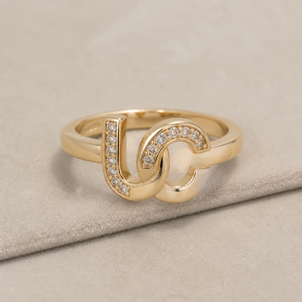 I want a design that say UC on it I want it to look like a marriage wedding
photorealistic jewelry design, I want a design that say UC on it I want it to look like a marriage wedding
, modern style, just the design no text