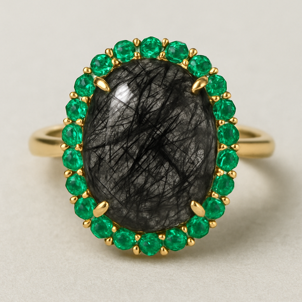 Black rutilated quartz with emerald accent stones 