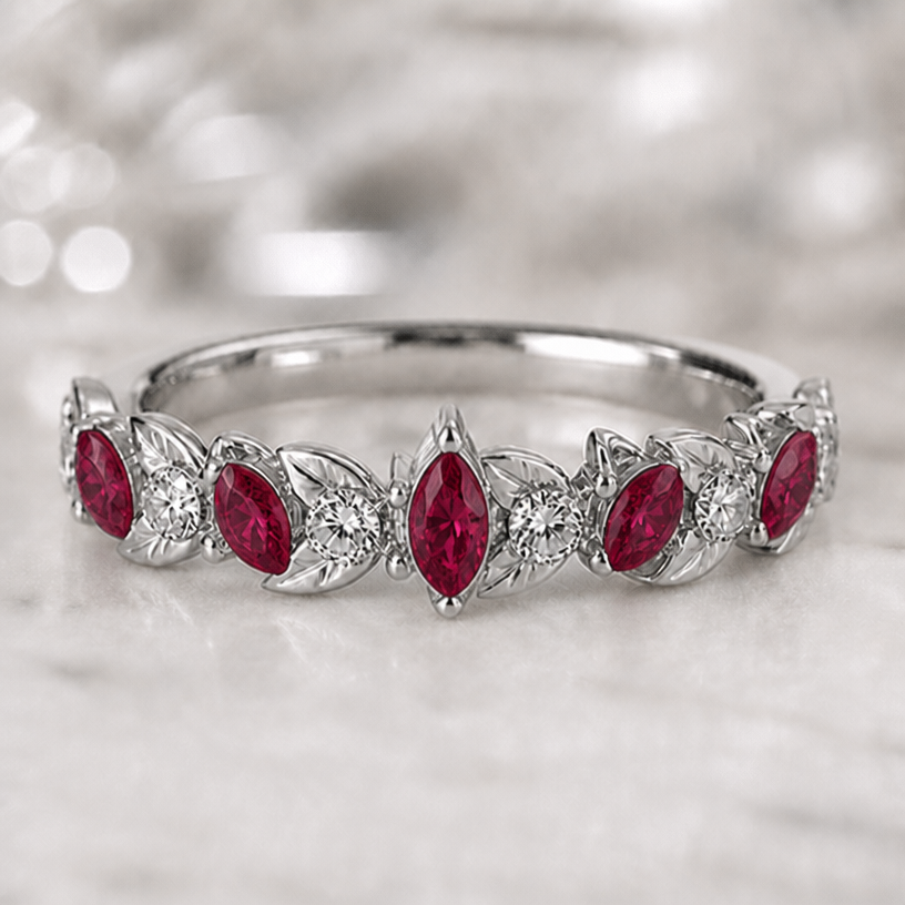 update design to include a center marquis ruby
edit the attached jewelry design with these instructions: update design to include a center marquis ruby. keep it photorealistic, just the design no text
