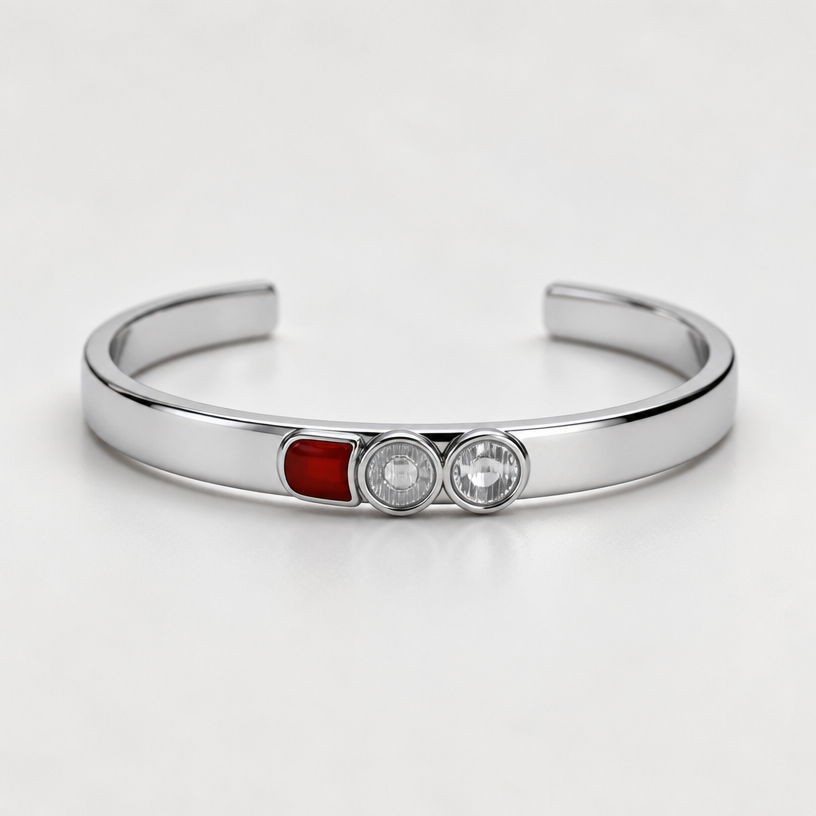 A women's bracelet made of silver, minimalist, simple and delicate, clean lines. a cuff that has the shape of the car lights in the reference photo the clear ones are clear stone and the red one is enamel color they are in the cuff itself meaning they cant be bigger than the cuff itself the cuff is 2mm*6mm
using the attached image as a visual reference, create A women's bracelet made of silver, minimalist, simple and delicate, clean lines. a cuff that has the shape of the car lights in the reference photo the clear ones are clear stone and the red one is enamel color they are in the cuff itself meaning they cant be bigger than the cuff itself the cuff is 2mm*6mm. photorealistic, just the design no text