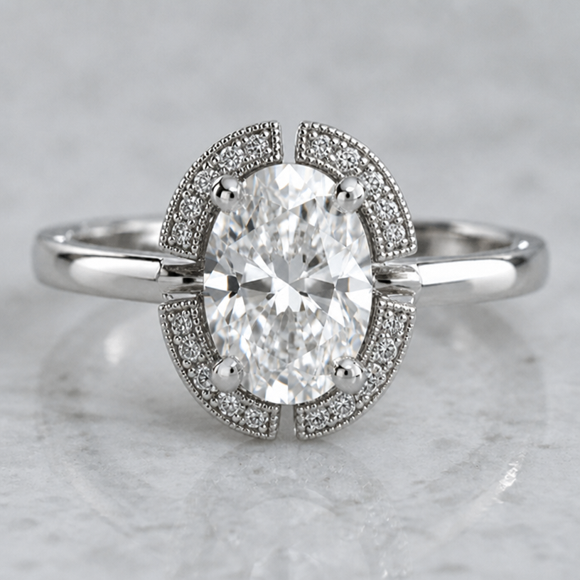 Split the sections of the halo at the four prongs around the centre stone and make the setting of the halo stones more Victorian
edit the attached jewelry design with these instructions: Split the sections of the halo at the four prongs around the centre stone and make the setting of the halo stones more Victorian. keep it photorealistic, just the design no text