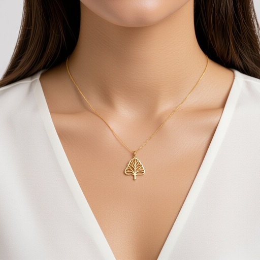 Золотой кулон с изображением дерева с завитками