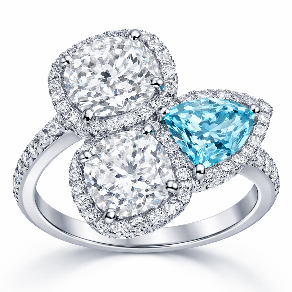 Ring with 2 cushion cut diamonds, on a little smaller than the other, add aquamarine