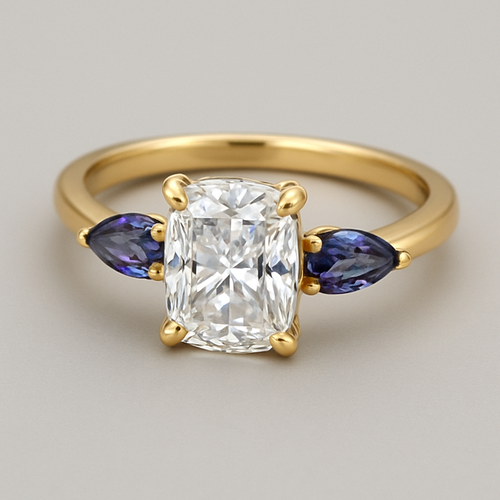 2 carat elongated cushion cut diamond engagement ring with double claw prongs in yellow gold ring with marquise shaped alexandrite side stones 