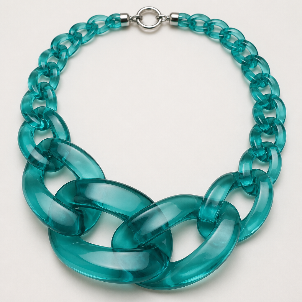 A women's necklace. create a chunky Cuban links style plastic necklace that is graduated and exaggerated in the first three links.translucent color teal
photorealistic jewelry design, A women's necklace. create a chunky Cuban links style plastic necklace that is graduated and exaggerated in the first three links.translucent color teal, modern style, just the design no text