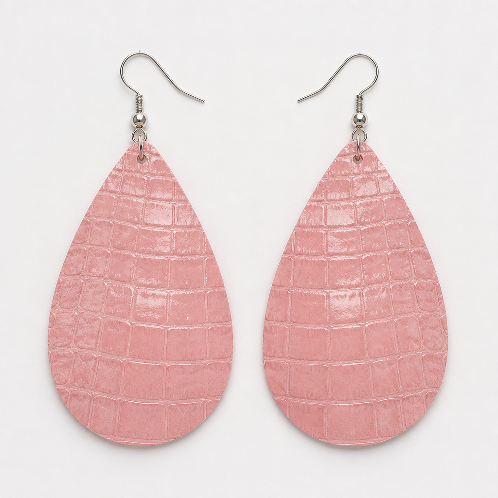 Create an image to show a polished look on the reverse side of a pink crocodile textured leather teardrop genuine leather earrings.
photorealistic jewelry design, Create an image to show a polished look on the reverse side of a pink crocodile textured leather teardrop genuine leather earrings. , minimalist style, just the design no text
