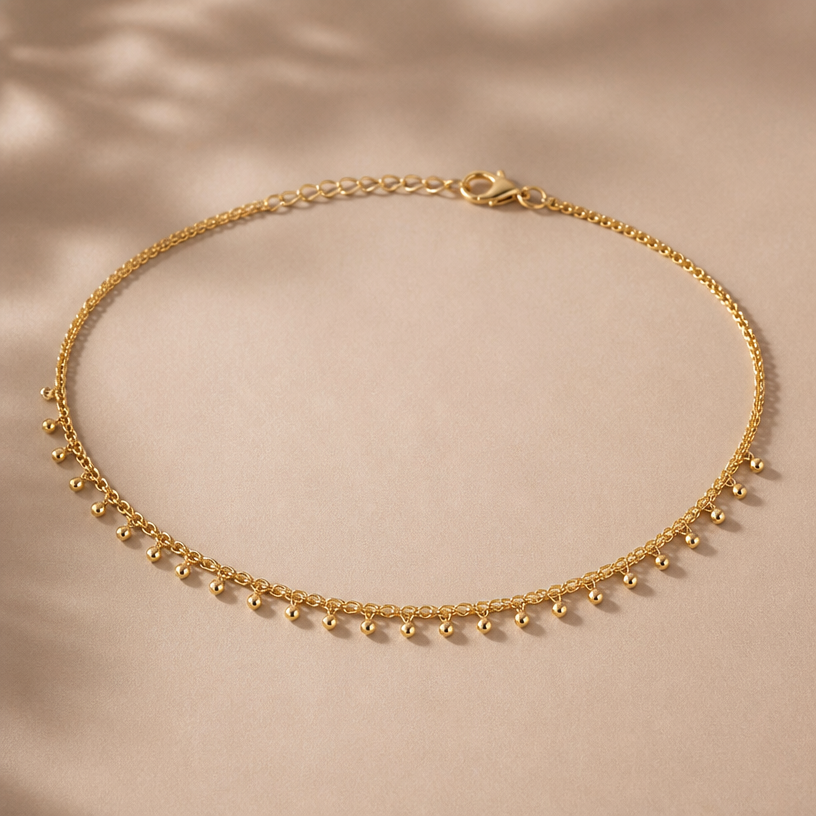 A minimalist women's anklet made of gold, minimalist, simple and delicate, clean lines
using the attached image as a visual reference, create A minimalist women's anklet made of gold, minimalist, simple and delicate, clean lines. photorealistic, just the design no text