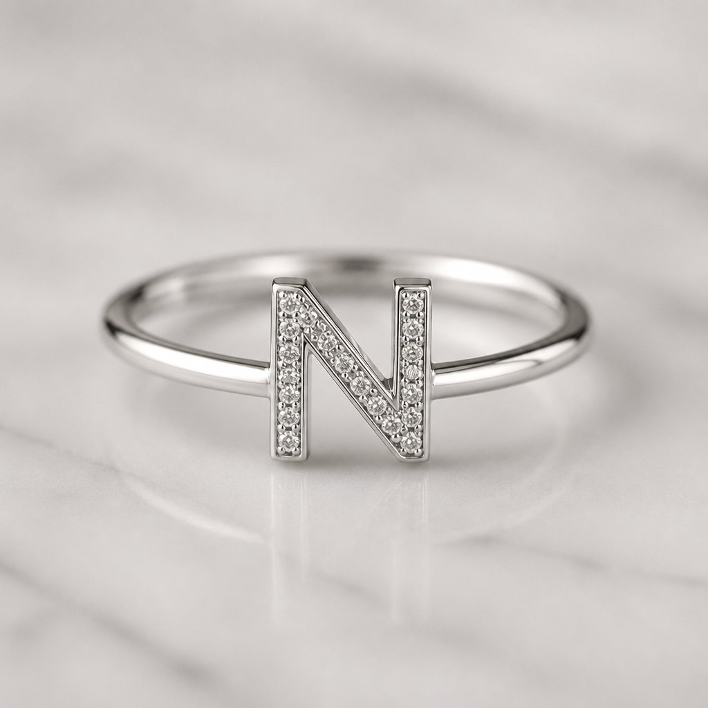 A women's ring. it should be a silver ring with the alphabet N and small small diamonds should be used in it
and a minimalistic white design
photorealistic jewelry design, A women's ring. it should be a silver ring with the alphabet N and small small diamonds should be used in it
and a minimalistic white design, modern style, just the design no text