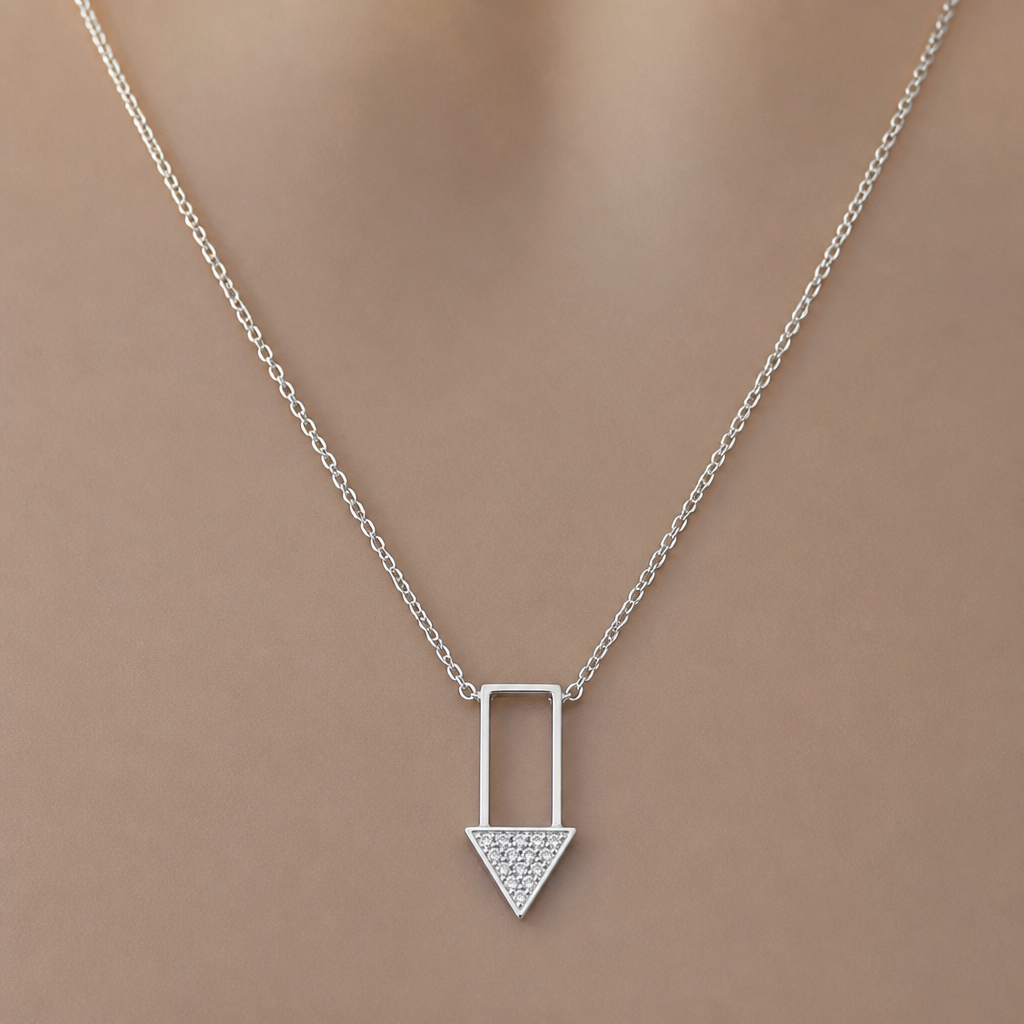 A women's necklace made of silver. Flèche moderne, rectangle avec triangle en line fine remplit de diamand, qui pointe vers le bas
photorealistic jewelry design, A women's necklace made of silver. Flèche moderne, rectangle avec triangle en line fine remplit de diamand, qui pointe vers le bas, modern style, just the design no text