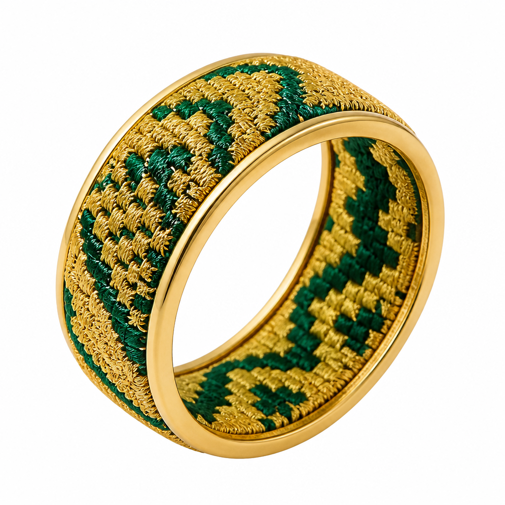 A women's ring. A unique luxury high jewelry ring inspired by authentic Balochi embroidery. The ring band itself is made from traditional Balochi embroidered fabric, wrapping completely around the finger as a full circular ring. The fabric is the main body of the ring, not a decoration placed on top.
The embroidered fabric is carefully enclosed and framed by a thin elegant 18k yellow gold structure surrounding the entire ring. The gold frame continues underneath the fabric as a strong and refined support base. The gold should look handcrafted, polished, luxurious and high quality.
The Balochi embroidery pattern contains only two colors: rich metallic gold thread and deep emerald green details. No other colors. The combination of golden embroidery and emerald green creates a royal Persian luxury feeling.
Persian heritage meets modern international high jewelry design. Elegant minimalist style, sophisticated craftsmanship, unique artistic concept for a luxury jewelry brand. Ultra realistic jewelry photography, macro close-up, realistic gold texture, detailed fabric embroidery, premium product presentation, white background, studio lighting.
No gemstones, no diamonds, no extra decorations, no colorful patterns. Focus only on the beauty of Balochi embroidered fabric, emerald green and gold colors, and the 18k yellow gold frame.
photorealistic jewelry design, A women's ring. A unique luxury high jewelry ring inspired by authentic Balochi embroidery. The ring band itself is made from traditional Balochi embroidered fabric, wrapping completely around the finger as a full circular ring. The fabric is the main body of the ring, not a decoration placed on top.
The embroidered fabric is carefully enclosed and framed by a thin elegant 18k yellow gold structure surrounding the entire ring. The gold frame continues underneath the fabric as a strong and refined support base. The gold should look handcrafted, polished, luxurious and high quality.
The Balochi embroidery pattern contains only two colors: rich metallic gold thread and deep emerald green details. No other colors. The combination of golden embroidery and emerald green creates a royal Persian luxury feeling.
Persian heritage meets modern international high jewelry design. Elegant minimalist style, sophisticated craftsmanship, unique artistic concept for a luxury jewelry brand. Ultra realistic jewelry photography, macro close-up, realistic gold texture, detailed fabric embroidery, premium product presentation, white background, studio lighting.
No gemstones, no diamonds, no extra decorations, no colorful patterns. Focus only on the beauty of Balochi embroidered fabric, emerald green and gold colors, and the 18k yellow gold frame., modern style, just the design no text