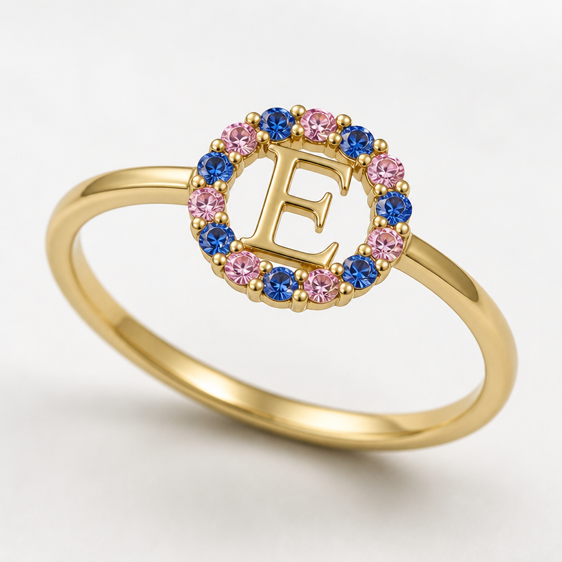 A minimalist women's ring, minimalist, simple and delicate, clean lines. um anel de 15 anos na cor dourada com inicial E com pedrinhas azul e pedrinhas rosa em volta
using the attached image as a visual reference, create A minimalist women's ring, minimalist, simple and delicate, clean lines. um anel de 15 anos na cor dourada com inicial E com pedrinhas azul e pedrinhas rosa em volta. photorealistic, just the design no text