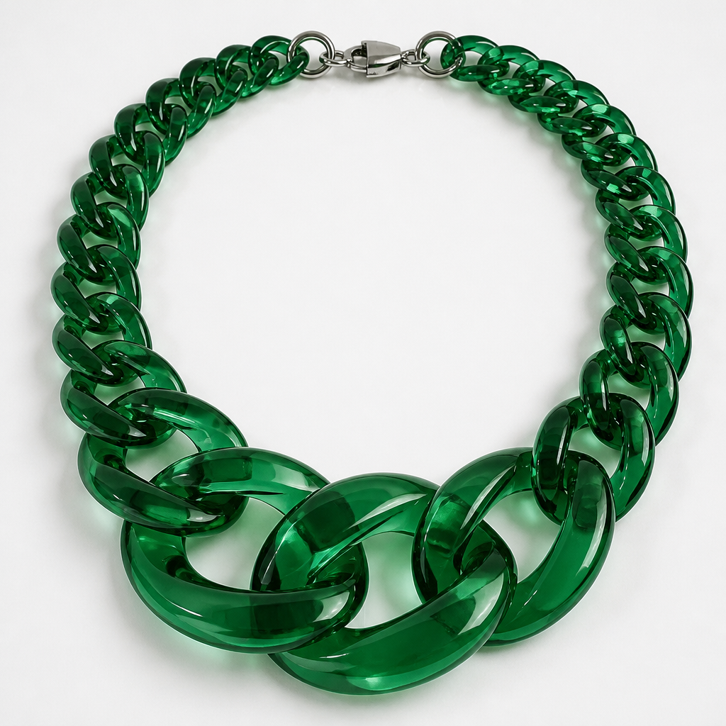 A women's necklace. create a chunky Cuban Link style plastic chain that is o graduated and exaggerated in the first front three links that is translucent lucite in bright emerald green color
photorealistic jewelry design, A women's necklace. create a chunky Cuban Link style plastic chain that is o graduated and exaggerated in the first front three links that is translucent lucite in bright emerald green color, modern style, just the design no text