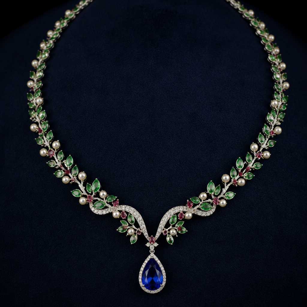 A luxury women's necklace made of white gold with pearl stones suitable for gift. a necklace with a gap in the centre the chain should be with a green colour leaf like structure ruby and at in between a unique colour pearl, in the centre there should be a gap and a pendent should be a blue colour water drop 💧 shape in a royal blue
photorealistic jewelry design, A luxury women's necklace made of white gold with pearl stones suitable for gift. a necklace with a gap in the centre the chain should be with a green colour leaf like structure ruby and at in between a unique colour pearl, in the centre there should be a gap and a pendent should be a blue colour water drop 💧 shape in a royal blue, luxury style, just the design no text