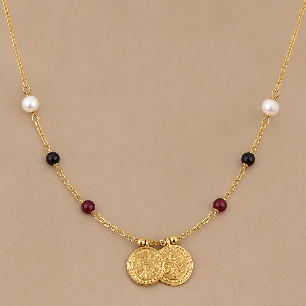 A bohemian women's necklace made of gold with pearl and garnet stones. a delicate gold chain with 2 gold coins in the middle and single pearls , single black beads,single red beads on each side of a chain
photorealistic jewelry design, A bohemian women's necklace made of gold with pearl and garnet stones. a delicate gold chain with 2 gold coins in the middle and single pearls , single black beads,single red beads on each side of a chain, bohemian style, just the design no text