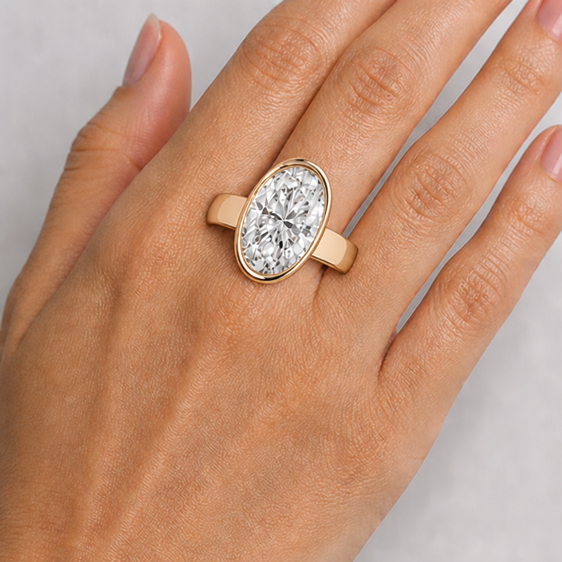 the stone is 16mm in length and 11 in width, the band is 4mm
edit the attached jewelry design with these instructions: the stone is 16mm in length and 11 in width, the band is 4mm. keep it photorealistic, just the design no text
