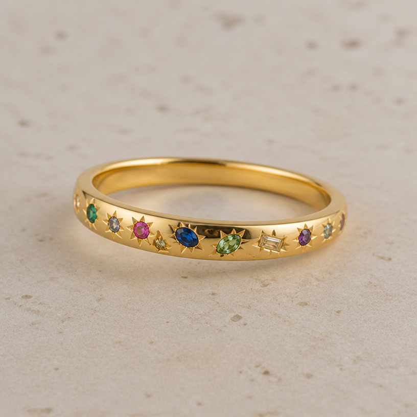 Significantly less chunky like 3mm wide maximum and the stones are different shapes and sizes and less uniform
edit the attached jewelry design with these instructions: Significantly less chunky like 3mm wide maximum and the stones are different shapes and sizes and less uniform. keep it photorealistic, just the design no text