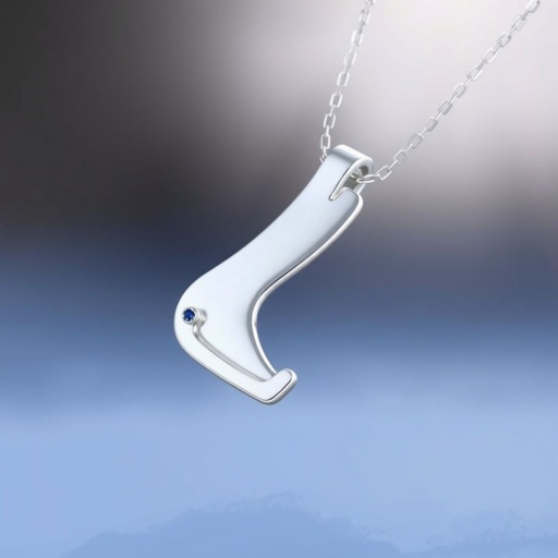 Silver pendant in of ice skating blade only no boots