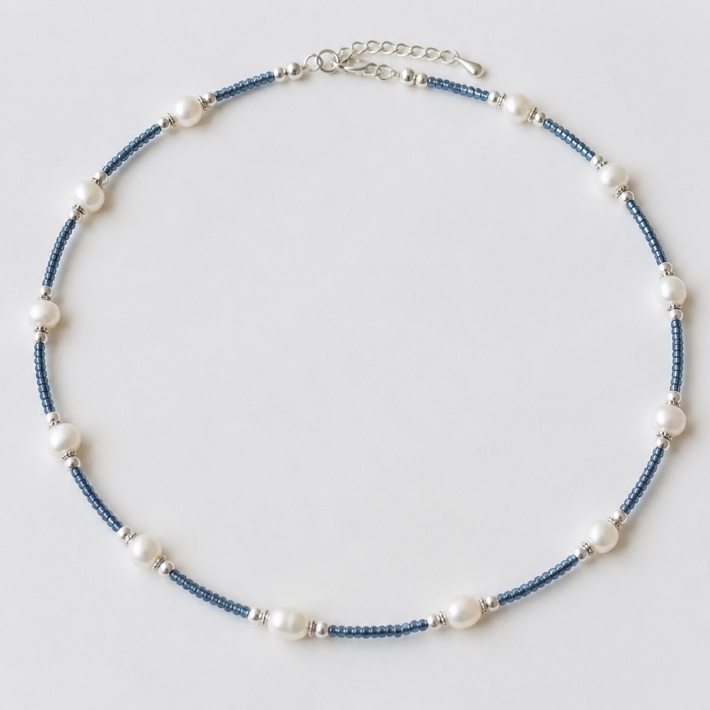 A beaded women's necklace made of silver suitable for daily wear. collar con mostacillas azules y perlas blancas
photorealistic jewelry design, A beaded women's necklace made of silver suitable for daily wear. collar con mostacillas azules y perlas blancas, beaded style, just the design no text