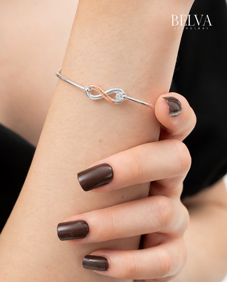 Virtual try-on
Put the jewelry from image 2 on the person in image 1. Place it naturally as bracelet. Keep the person's face, hair, skin tone, pose and the background exactly the same. Reproduce the jewelry's exact design, metal and stones faithfully with realistic scale, lighting and shadows. Photorealistic.