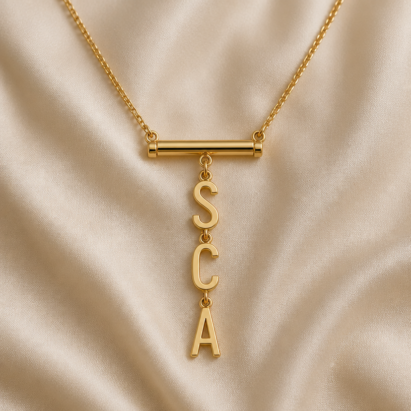 Hang the initials in a “Y” style necklace