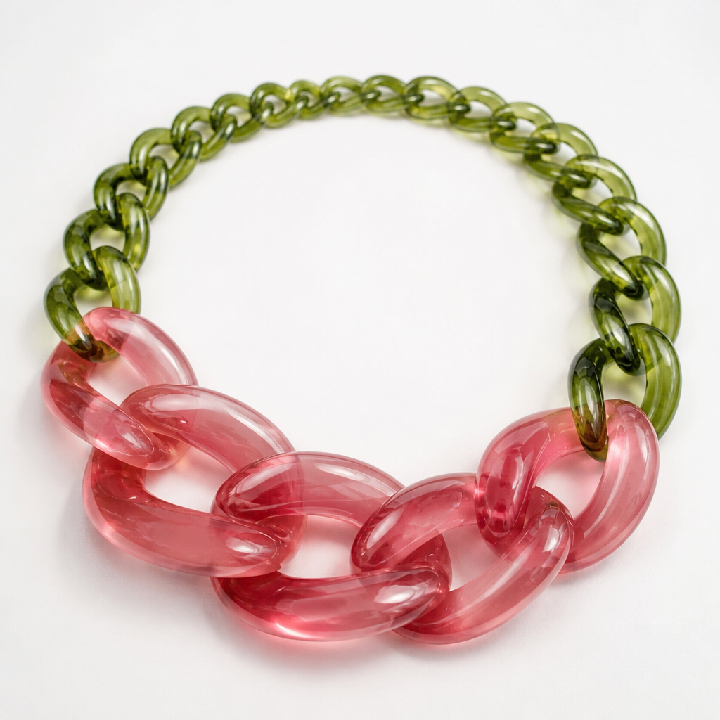 A women's necklace. create a chunky Cuban links style plastic necklace that is graduated and exaggerated in the first three links of translucent colors with the back part being green like a flower stem and the front part being Salma pink
photorealistic jewelry design, A women's necklace. create a chunky Cuban links style plastic necklace that is graduated and exaggerated in the first three links of translucent colors with the back part being green like a flower stem and the front part being Salma pink, modern style, just the design no text