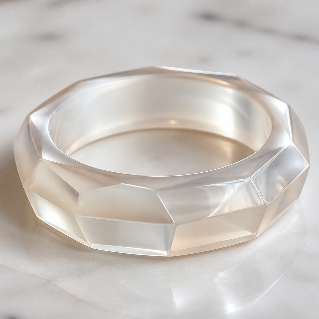 A geometric women's bracelet suitable for daily wear. a a pearl coloured yet transparent looking resin bracelet
photorealistic jewelry design, A geometric women's bracelet suitable for daily wear. a a pearl coloured yet transparent looking resin bracelet, geometric style, just the design no text