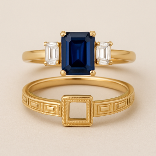 2 gold rings, the first is an emerald cut sapphire engagement ring with smaller emerald cut diamonds flanking the sapphire and the second is an art deco wedding band with a square gap to allow the gems of the first ring to over lap the wedding band