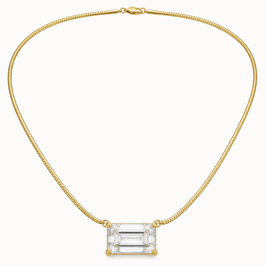 A 10ct emerald cut diamond that is 14mmx10mm. Diamond is set in a 14kt yellow gold basket setting, prong set, low profile, east to west orientation (horizontal). Double D slide bail on a 4mm omega chain 14inches. The loops are on the top left and right sides of the diamond, not right next to each other. All metal is yellow gold. Show the whole chain too
photorealistic jewelry design, A 10ct emerald cut diamond that is 14mmx10mm. Diamond is set in a 14kt yellow gold basket setting, prong set, low profile, east to west orientation (horizontal). Double D slide bail on a 4mm omega chain 14inches. The loops are on the top left and right sides of the diamond, not right next to each other. All metal is yellow gold. Show the whole chain too, modern style, just the design no text