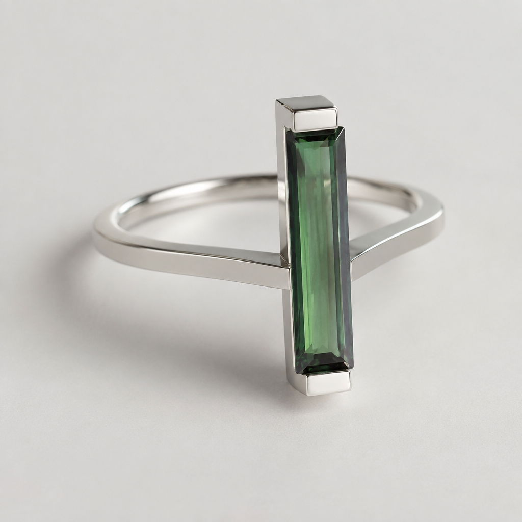 A women's ring made of silver, ultra-minimalist, very simple and clean, understated, no embellishments. I have a long rectangle tourmaline. I want you to make something youve never seen made
photorealistic jewelry design, A women's ring made of silver, ultra-minimalist, very simple and clean, understated, no embellishments. I have a long rectangle tourmaline. I want you to make something youve never seen made, modern style, just the design no text