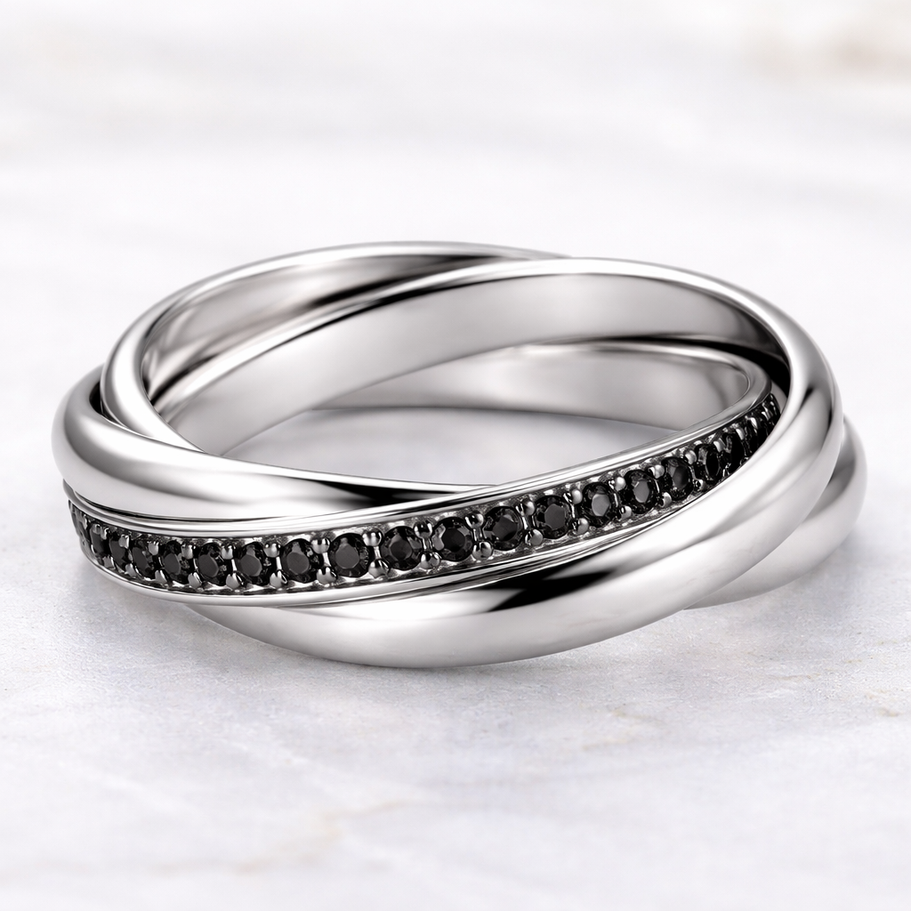 Russian wedding band
Each band is 2.5mm wide
1 black ring
2 silver rings
No shadows on the metal please