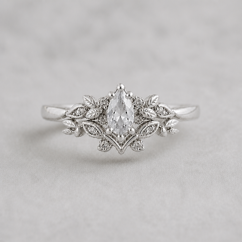 please center the main stone more into the middle, keep all other details of the current design
edit the attached jewelry design with these instructions: please center the main stone more into the middle, keep all other details of the current design. keep it photorealistic, just the design no text