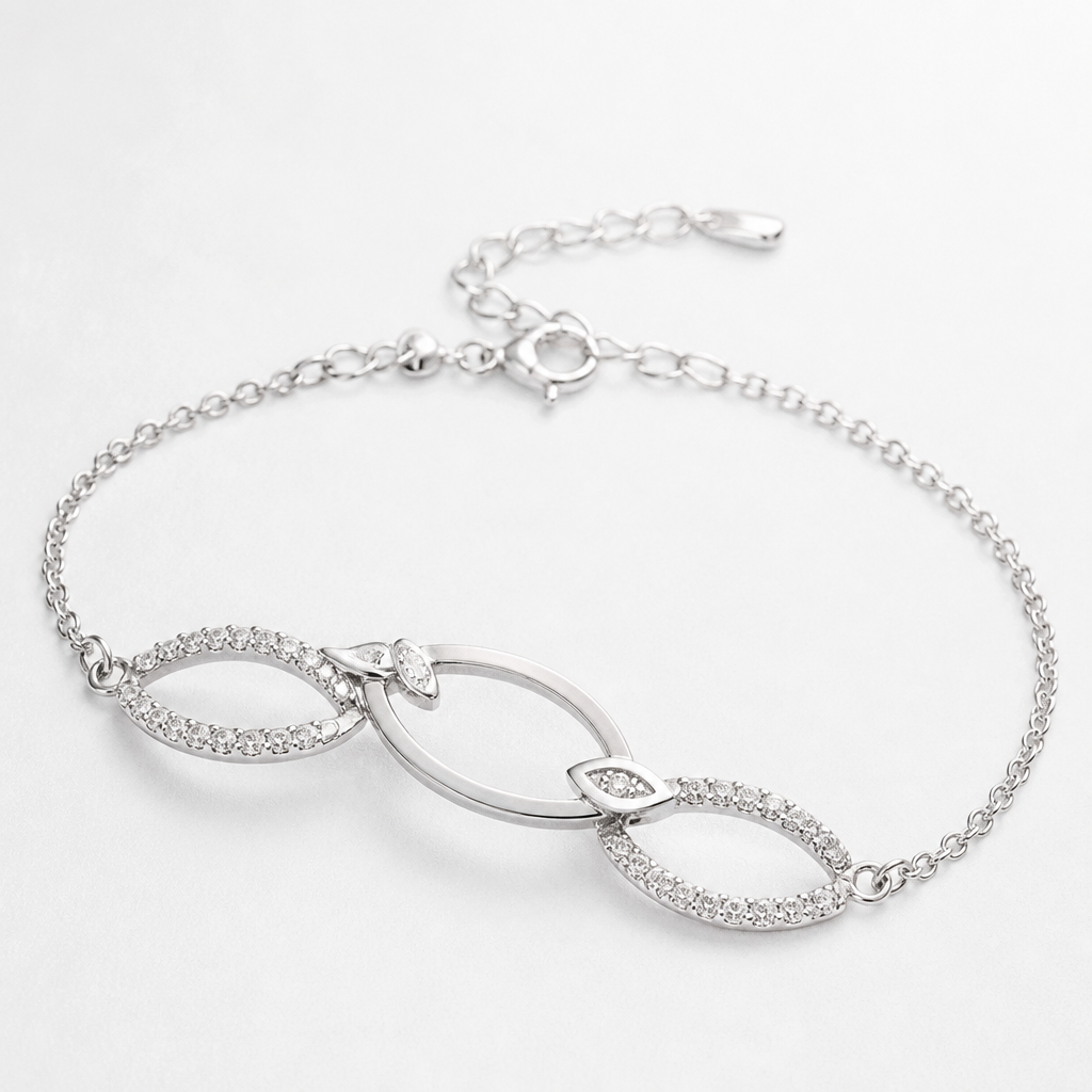 A women's bracelet made of silver with diamond stones. bracelet avec design 3 oval couché peut inclure marquise de metal fin avec chaine, jaime les espaces vide, courbe eleguant feminin
photorealistic jewelry design, A women's bracelet made of silver with diamond stones. bracelet avec design 3 oval couché peut inclure marquise de metal fin avec chaine, jaime les espaces vide, courbe eleguant feminin, modern style, just the design no text