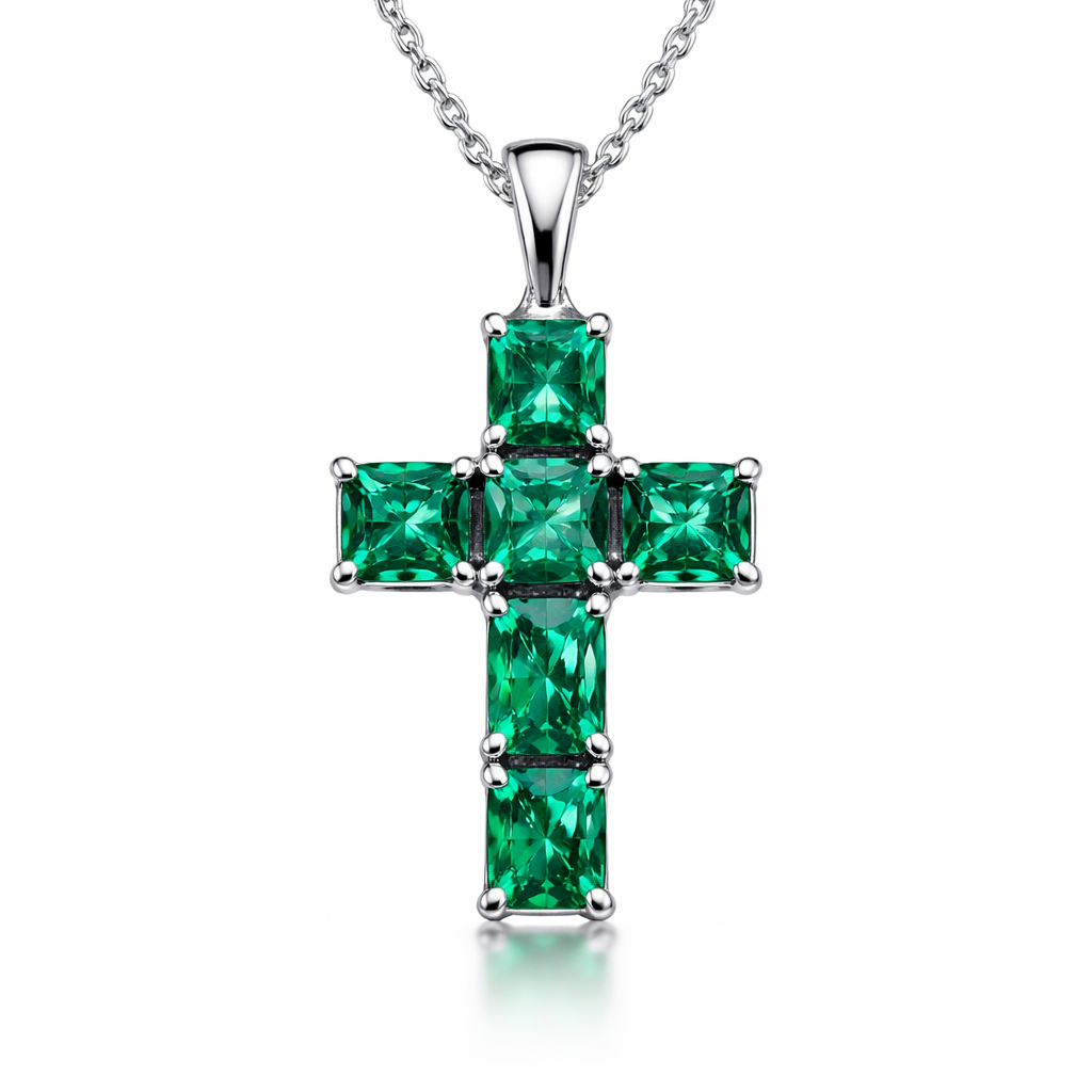 Emerald Cross in white gold. Classic and stunning. No other stones.