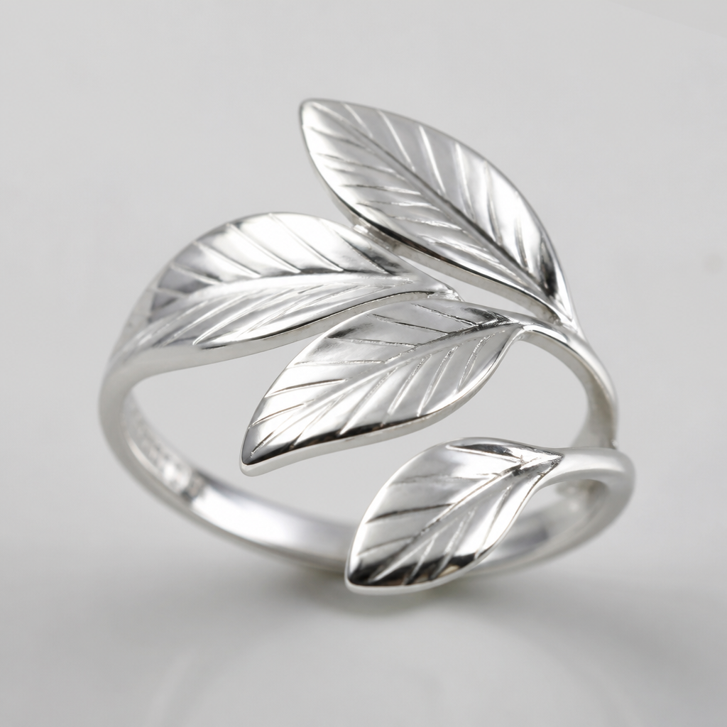 A women's ring. anillo de plata con forma de ojas que se unen por sobre el dedo
photorealistic jewelry design, A women's ring. anillo de plata con forma de ojas que se unen por sobre el dedo, modern style, just the design no text