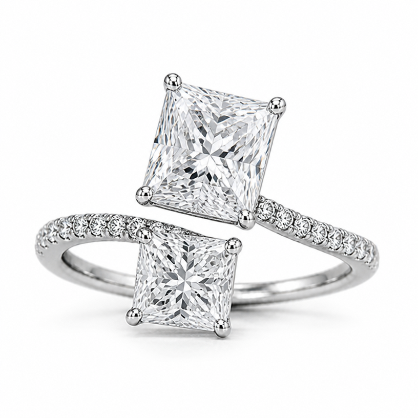 Make the radiant cut diamond more elongated and the cushion cut diamond slightly smaller and completely square
edit the attached jewelry design with these instructions: Make the radiant cut diamond more elongated and the cushion cut diamond slightly smaller and completely square. keep it photorealistic, just the design no text